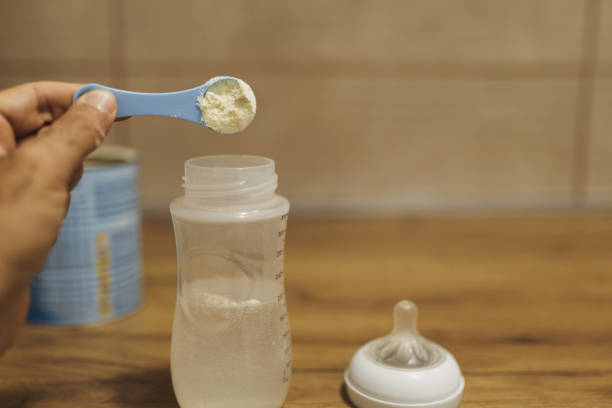 istock Preparing milk formula for baby 2174975930