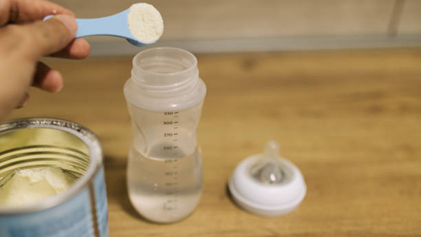 istock Preparing milk formula for baby 2174975972