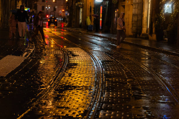 Lviv, Ukraine - September 14, 2024: Market square in Lviv, Ukraine at rainy night