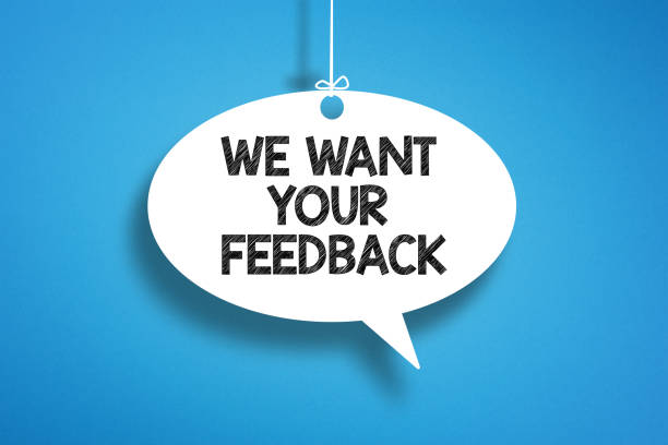 istock We Want Your Feedback written in speech bubble on blue background 2174999170