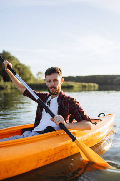 istock Portrait of Handsome Man on Kayaking Adventures at Sunset 2175012649
