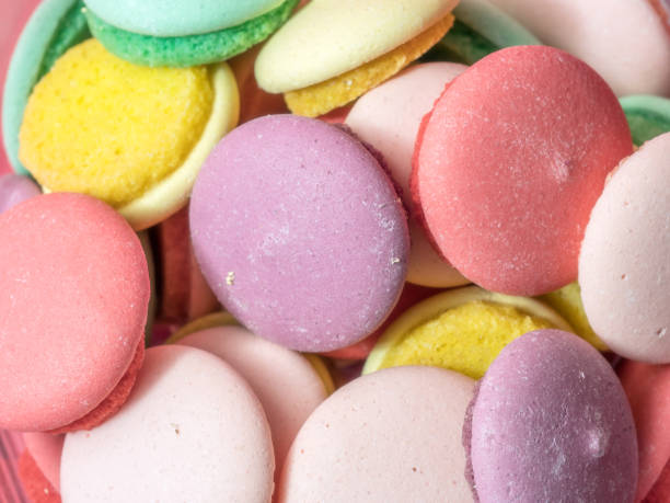 istock Colorful macaron cookies in glass bowl 2175025027