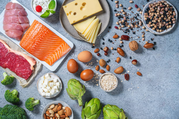 istock Assorted healthy protein sources for body building and healthy eating on a kitchen table. 2175030452