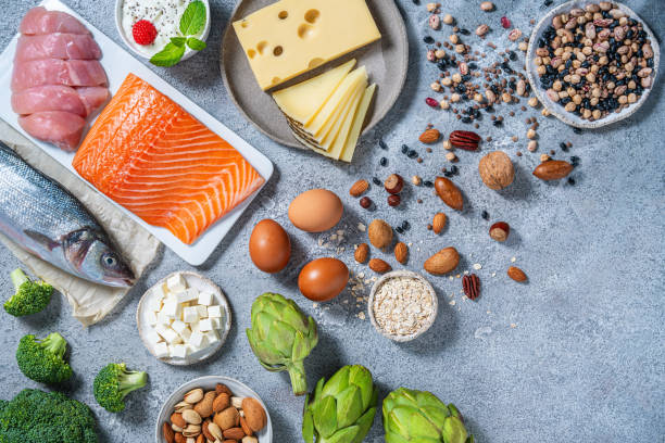 istock Assorted healthy protein source food good for body building: fish, meat, cheese, beans, eggs. 2175031152
