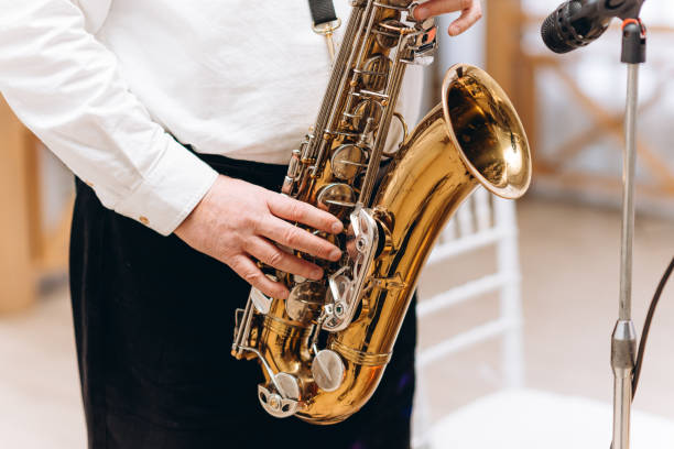 istock saxophonist musician plays the saxophone 2175032972