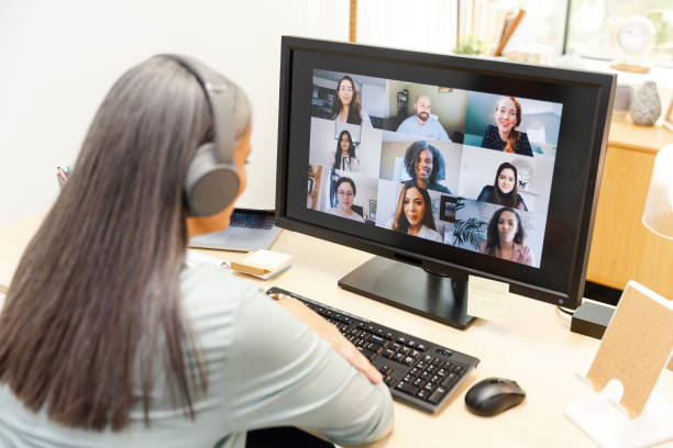 istock High angle view of diverse coworkers meeting virtually 2175034786