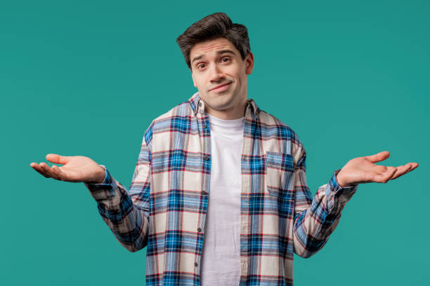 istock Ignorant mature 30s man, shoulders up - can't help,makes I dont know on blue 2175042957