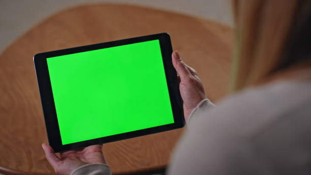istock Unrecognizable girl looking chroma key tablet at remote workplace close up. 2175044983