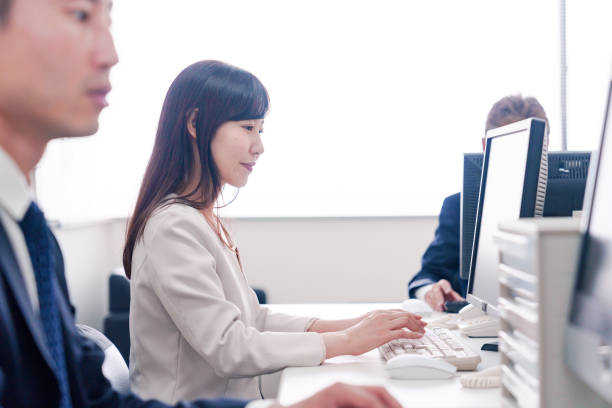 istock Female employee doing clerical work in an office 2175051341