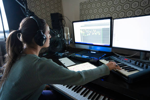 istock Musician Recording Piano Theme in Home Music Studio 2175051372
