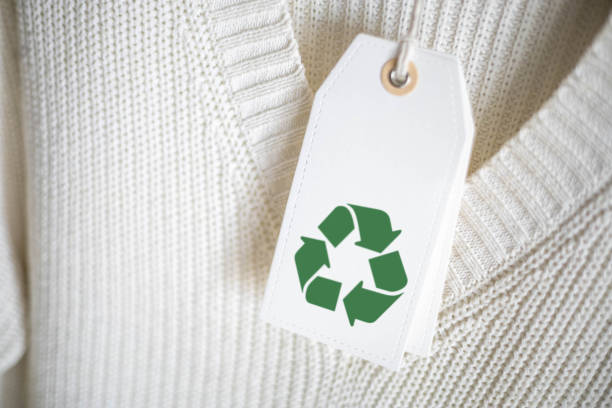 istock White knitted clothing with white label Recycling. 2175051467