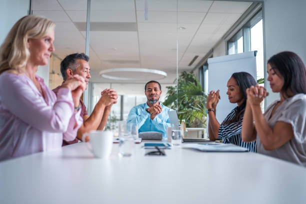 istock Diverse Office Team Engaging in Stretching Exercise at Conference Table 2175074644