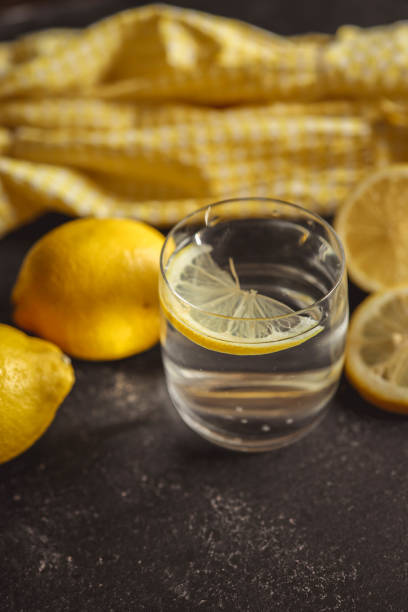 istock Cool freshly made lemonade in glass on wooden table. Space for text 2175080932