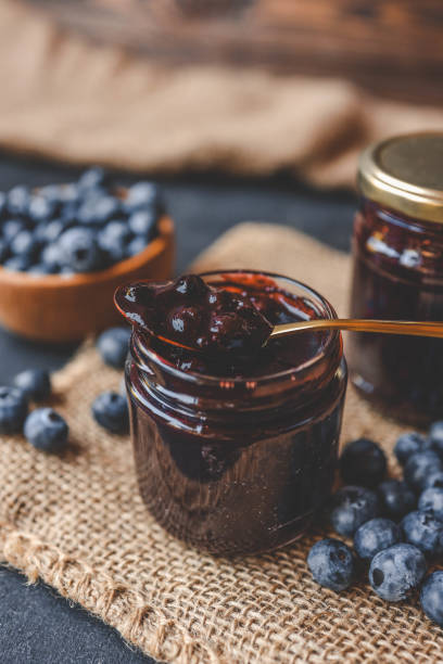 istock Delicious organic blueberry jam on dark background 2175081329