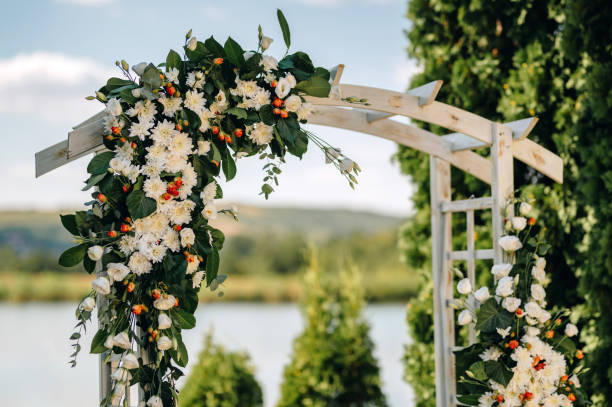 istock Beautiful wedding arch decorated with fresh flowers. 2175083073