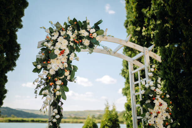 istock Beautiful wedding arch decorated with fresh flowers. 2175083075