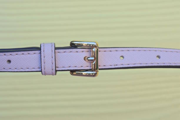 istock metal clasp on long thin leather pink bag strap 2175086203