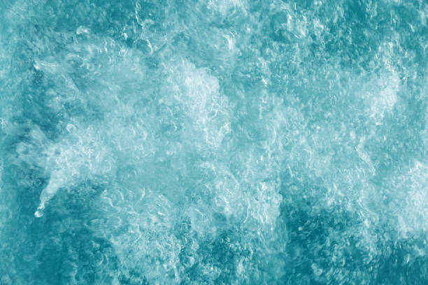 istock Bubbling water texture, flow thermal water as abstract background macro photo, spa and wellness theme, gentle ripples and gurgling on white turquoise aquatic surface, sea color gradient 2175087499
