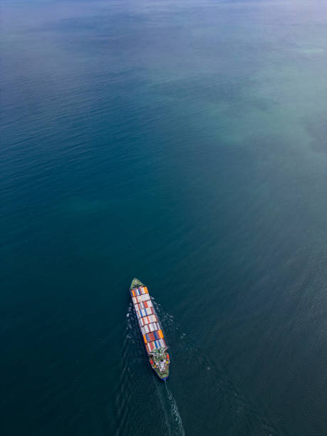 istock A container ship sails across the calm blue waters 2175087798