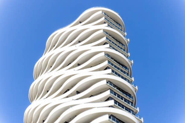 Modern apartment building against clear blue sky, background with copy space, full frame horizontal composition, Broadbeach, Gold Coast Queensland