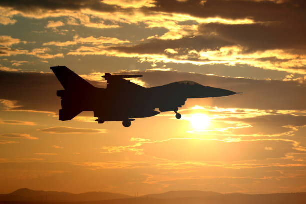 istock F 16 fighter plane on sunset 2175116958