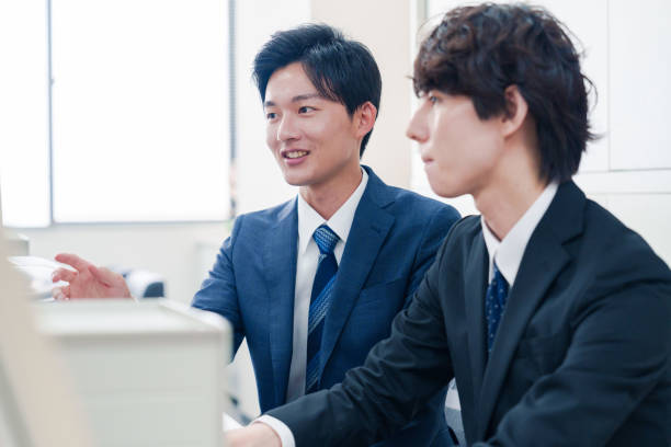 istock Two male businessmen discussing in their office 2175117145