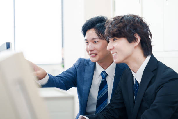 istock Two male businessmen discussing in their office 2175117147