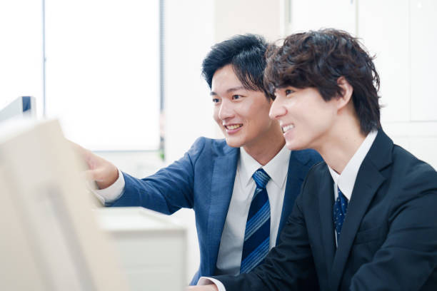 istock Two male businessmen discussing in their office 2175117149