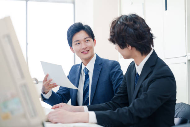 istock Two male businessmen discussing in their office 2175117156
