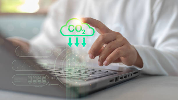 istock A person is typing on a laptop with a CO2 cloud on the screen 2175117417