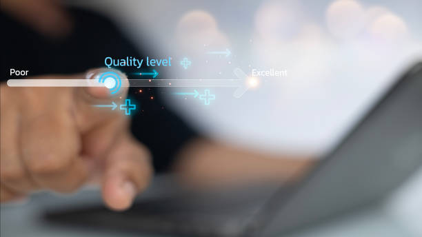 istock A person is pointing at a laptop screen with a quality level indicator 2175117470