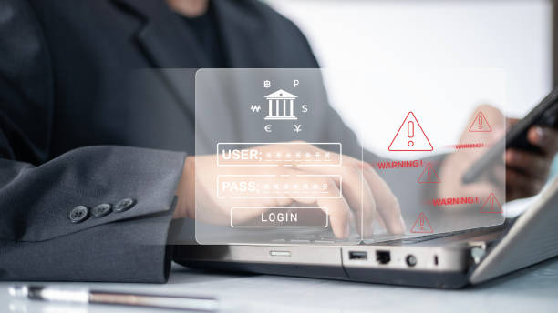 istock The businessmen are about to log into the system, but a notification suddenly appears, blocking their access to the banking platform. 2175117493