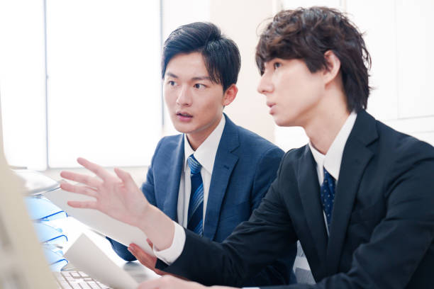 istock Male businessman discussing in his office 2175118409