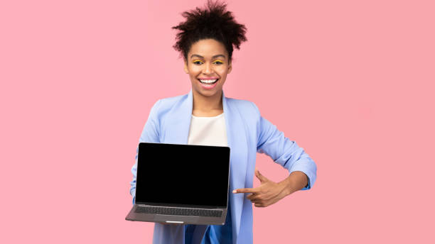 istock Happy afro girl showing black blank computer screen 2175118865