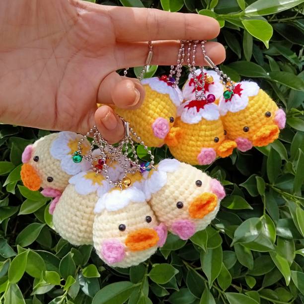 istock Crochet doll keychain, hand crocheted, handmade animal keychain for background texture, illustration 2175127656