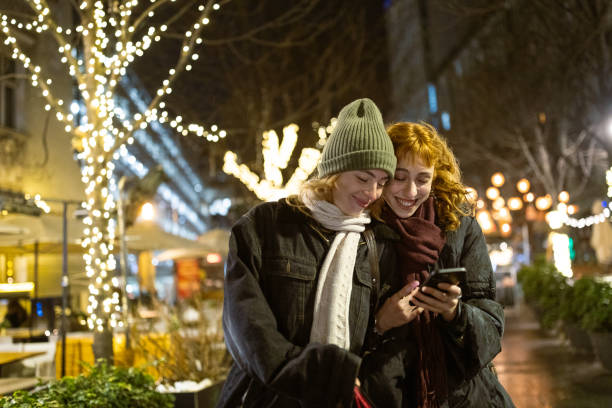 istock Christmas Evening Stroll with Friends 2175135537