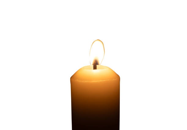 istock A single burning candle flame or light glowing on a big white candle isolated on white background with clipping path 2175138996