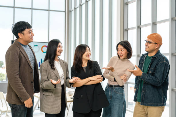 istock Asian business start up freelance people team analyzing statistics financial. Group Team of businesspeople man and woman Meeting Conference Discussion various topic Corporate Concept in office. 2175140400
