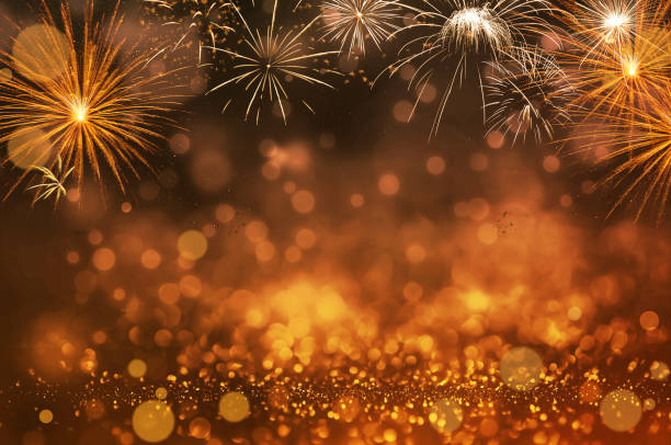 istock Red glitter and bokeh background with fireworks 2175144441