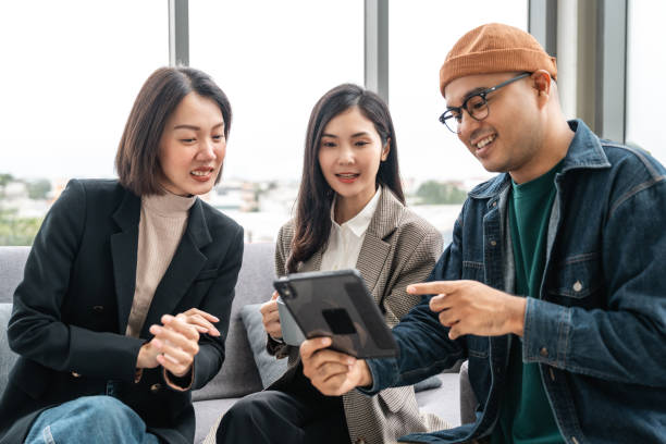 istock Asian business start up freelance people team analyzing statistics financial. Group Team of businesspeople man and woman Meeting Conference Discussion various topic Corporate Concept in office. 2175147655