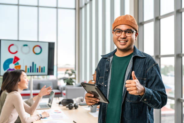 istock Asian business start up freelance people team analyzing statistics financial. Group Team of businesspeople man and woman Meeting Conference Discussion various topic Corporate Concept in office. 2175148508
