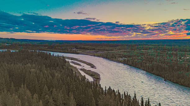 A beautiful sunrise mixes with the beauty of Interior Alaska. The beauty of the Copper River is enhanced with the beautiful colors that sunrise has brought to Alaska.