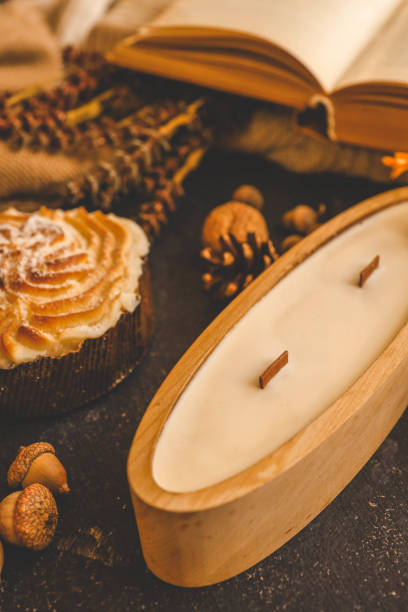 istock Candle in a wooden container, cozy autumn decor 2175153081