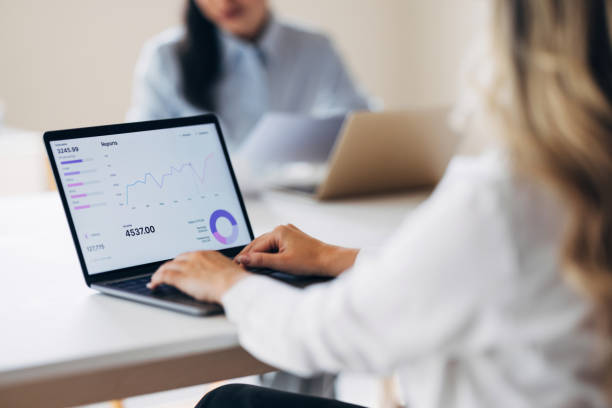 istock Business Analytics Meeting with Data Charts on Laptop Screen 2175153439