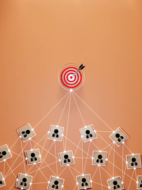istock Red dartboard and black arrow connection linkage with human icon for customer focus target group and customer relation management concept. 2175169744
