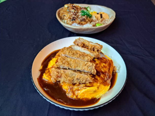 istock Delicious Chicken Egg Chiffon With Steamend Rice, Egg Chiffon, Omurice Sauce And Chicken Cutlet Caramelizend Onion. Food Menu. 2175169765