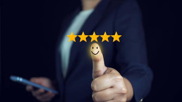 istock Customer satisfaction concept. Hand with thumb up Positive emotion smiley face icon and five star with copy space. 2175170457