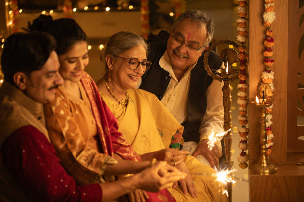 istock Two generation family burning sparklers at home 2175176421