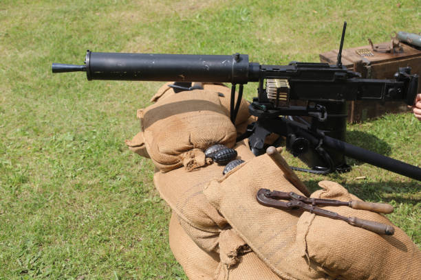 istock Historic machine gun used during the first and second world wars water-cooled with sandbags during a historical reenactment 2175176539