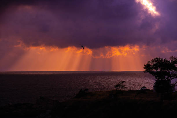Beautiful sunrise shining through thick clouds